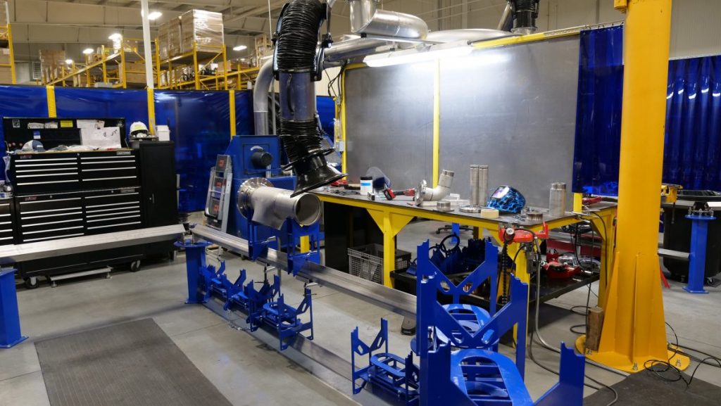 The new stainless steel welding and fabrication booth in the Technology Center specializes in coping and assembly of Industrial Water and Porta Kleen piping systems utilizing a specialty assembly jig.