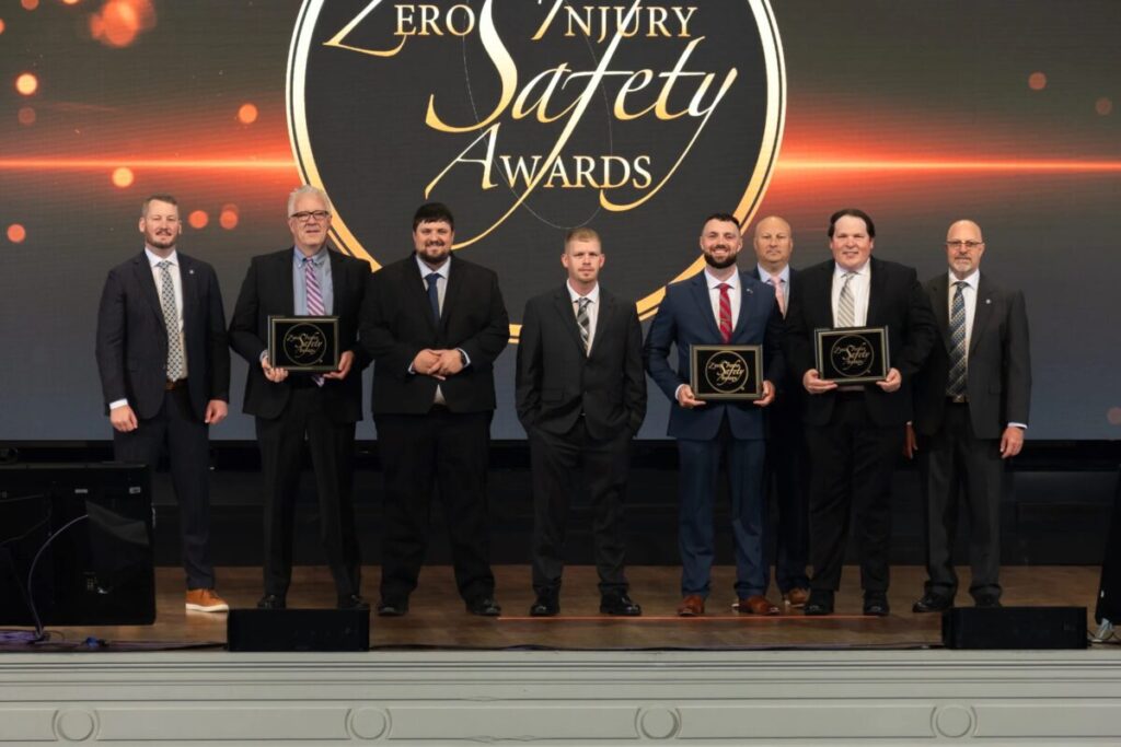 The 2022 Zisa Award winners are (left to right): Dan Hogan, TAUC; Mike Nicholson, MPW; Dakota Smith, MPW; Harold Keller, Painters & Allied Trades District Union 53; Joe Sammons, MPW; Jacob Snyder, TAUC; Anthony Tagliaferro, MPW and Troy Sundbom, TAUC